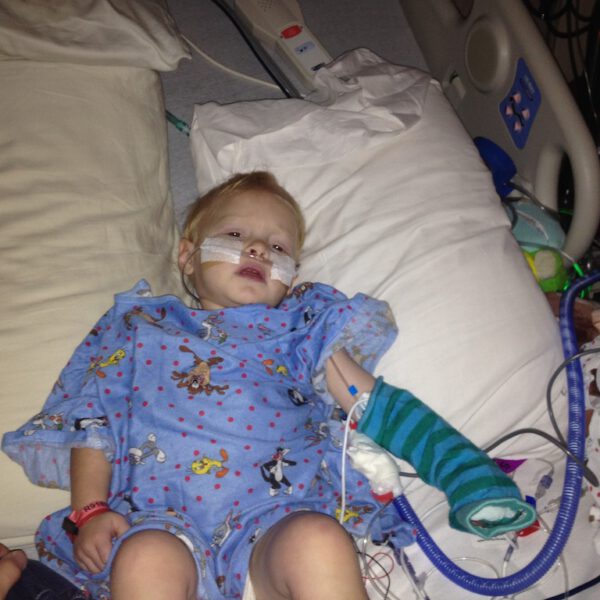 Jude in the ICU with tubes coming out of his arms and legs