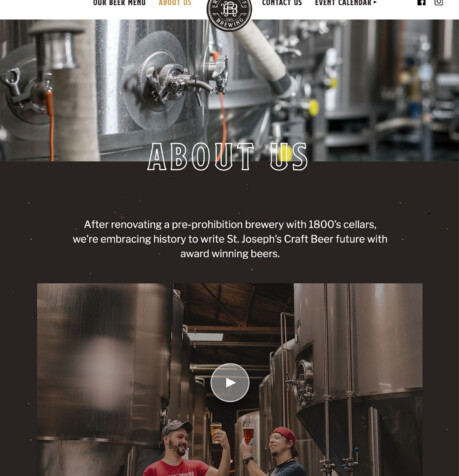 River Bluff Brewing about page showing two brewers toasting with glasses of beer surrounded by large stainless steel fermentation tanks